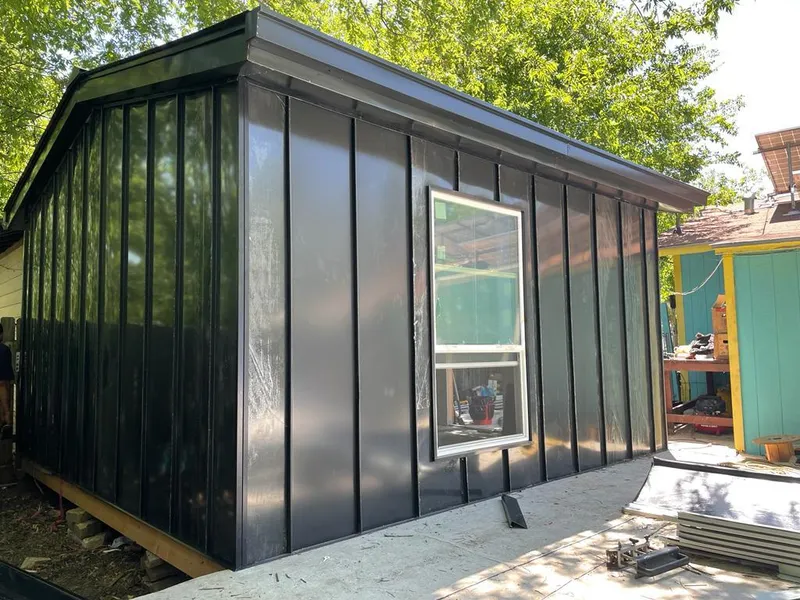 Black standing seam metal wall panels for Roof Inspection in Santa Monica